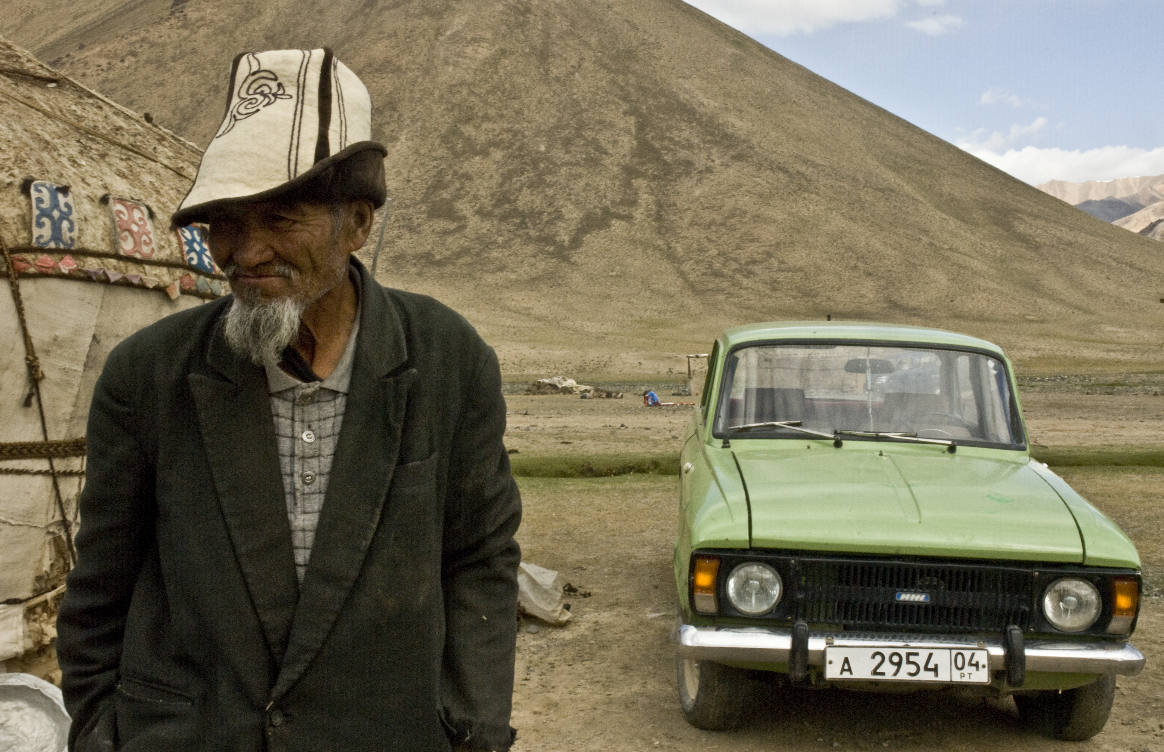 Kyrgyz man outside his yurt, Central Asia